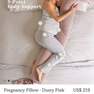 Blush Pink Bolster Pillow with Ring Accent